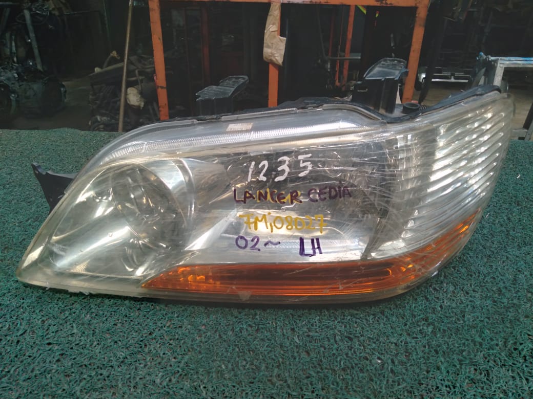 Farol Lancer Cedia 2000 LH