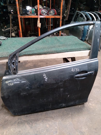 Puerta Delantera Demio 2002 LH