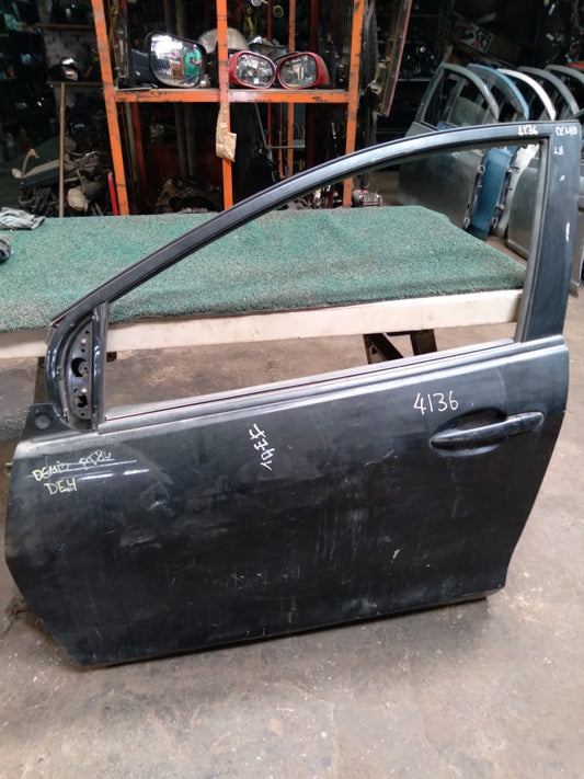 Puerta Delantera Demio 2002 LH