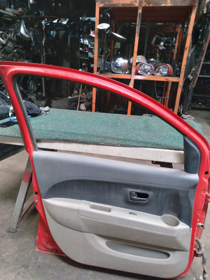 Puerta Delantera Passo 2004 LH