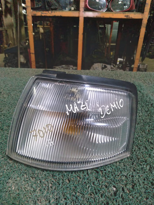 Guiñador Mazda Demio 1996 LH