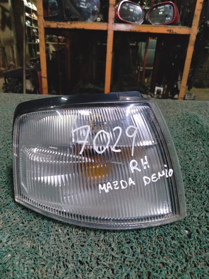 Guiñador Mazda Demio 1996 RH