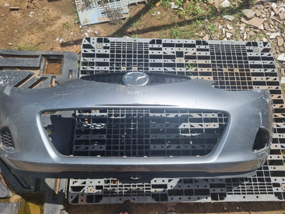 Parachoque Mazda Demio 7279
