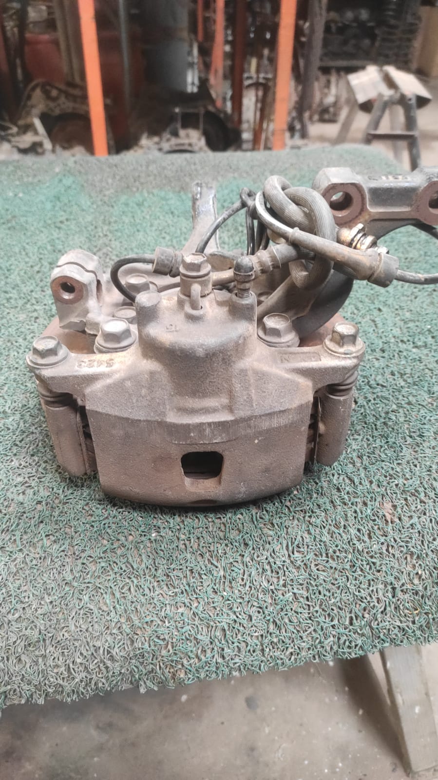 Macero Delantero LH Nissan Note