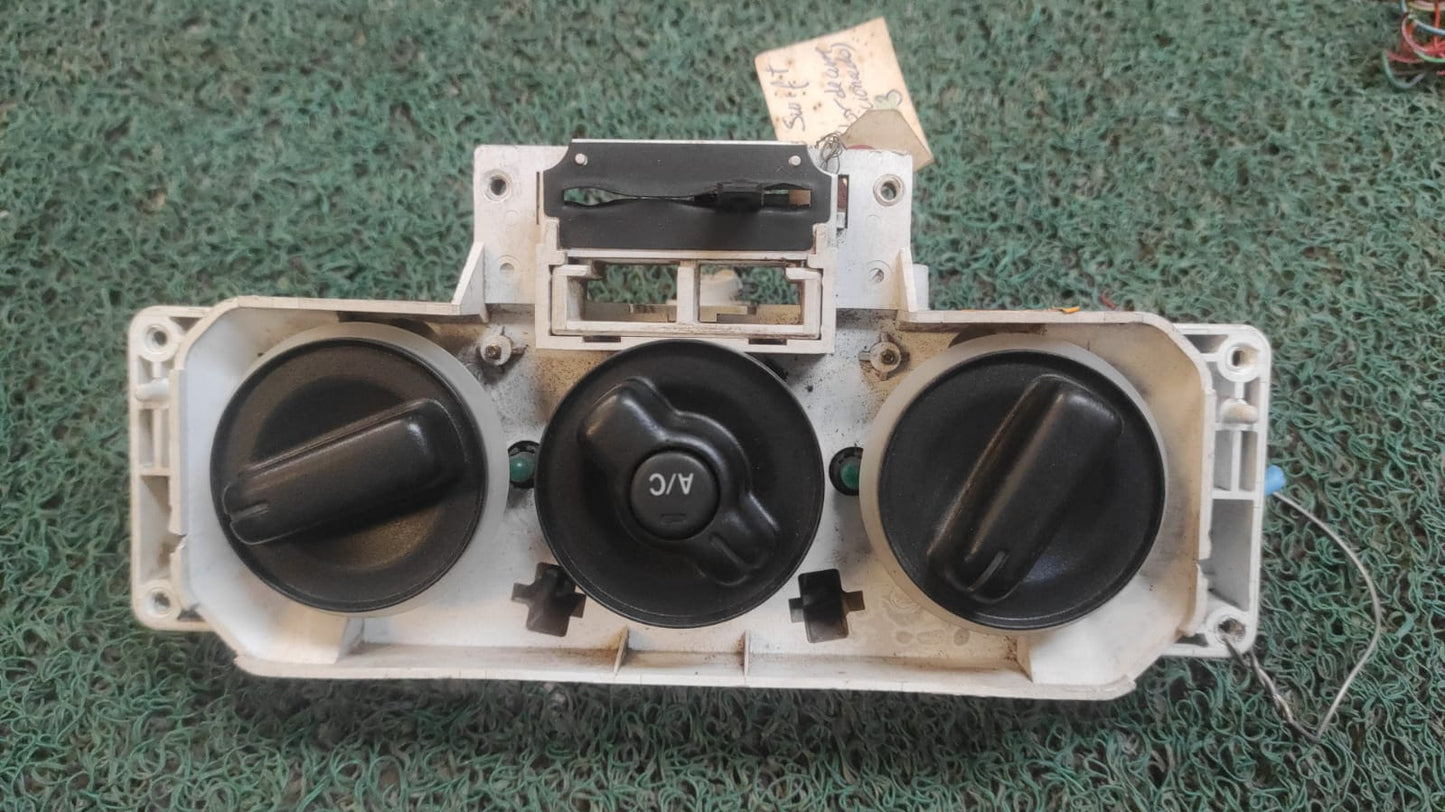 Panel de control A/C Suzuki Swift Ignis