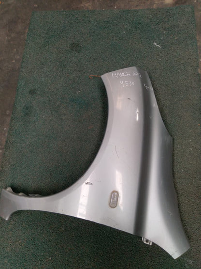 Guardabarro LH Nissan March K12