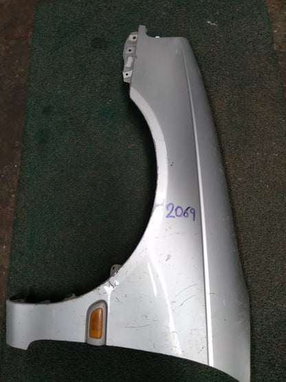 Guardabarro LH Toyota Caldina 1996